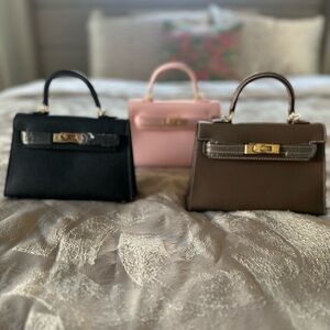 Elegant Women's Handbag Collection - Black, Pink, and Brown